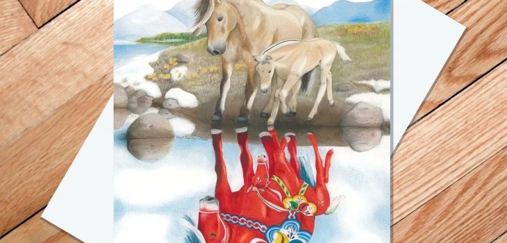 “Norwegian Fjord Reflection” 5x7 greeting card by Rachael Koppendrayer features tan Norwegian Fjord mare and foal with reflections as red Dala horses on grass, set against a wooden floor. Unique art card for any occasion.