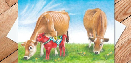 Two Hereford cows stand on grass under a blue sky; a red Dala cow with Swedish patterns stands between them, featured on the Card: Dala Cow: Hereford Greeting Card with Envelope.
