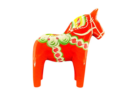 The Dala Horse: Red 6" Swedish Dala Horse Figurine is handcrafted in Sweden and features traditional Nordic folk art with green, white, and yellow patterns on a crisp white background.