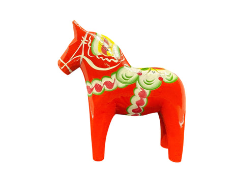 The Dala Horse: Red 6" Swedish Dala Horse Figurine is handcrafted in Sweden and features green, white, and yellow patterns—a charming Nordic folk art piece displayed on a white background.