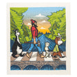 A cartoon of four anthropomorphic characters, reminiscent of the Abbey Road album cover, walks across a bridge in a forest. They carry eco-friendly cleaning tools, with one showcasing the MN Abbey Road Swedish Dish Cloth by Adam Turman, famous for its super absorbency.
