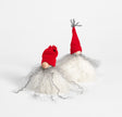 A pair of Swedish Gnome "Santa" figurines with wood and wool bodies, red caps, and long white and gray beards are handcrafted in Sweden and set against a plain white background.