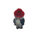 This charming Scandinavian figurine, Nisse Wife with a Knit Hat and a Rolling Pin, features a red knit hat and white beard, depicted from behind against a pristine white background.