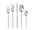 Introducing the Gense Dorotea Cutlery Set in matte steel: a modern classic featuring two forks, a knife, a tablespoon, and a teaspoon elegantly arranged vertically on a plain white background.