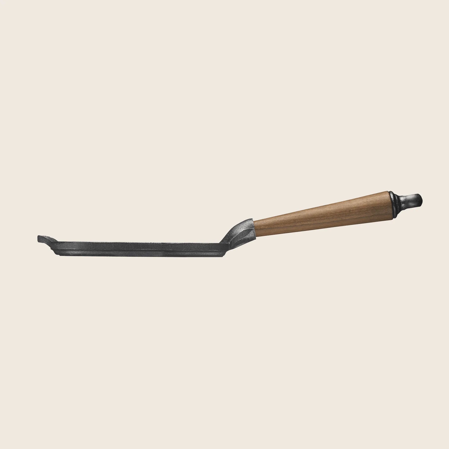 A Skeppshult product featuring a walnut handle and metal components, set against a plain background.