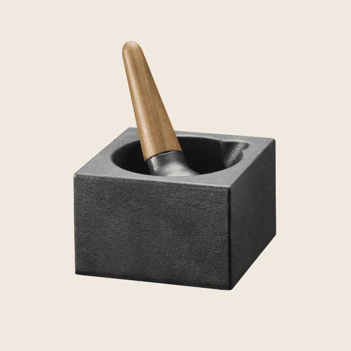 A square black Skeppshult: Mortar With Walnut Pestle is set against a plain background.