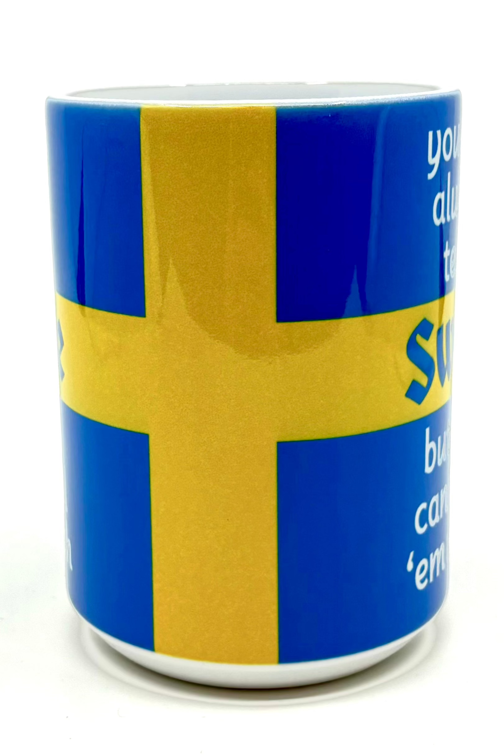 The 15 oz "You Can Tell a Swede" mug features a lively design incorporating the Swedish flag colors, complemented by partially white text set against a blue and yellow backdrop.