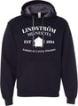 The Hoodie: Lindström Minnesota EST 1894 Hoodie – Black (Unisex) features white text that reads "Lindström Minnesota Est 1894 America’s Little Sweden" and a small house graphic.