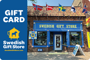 Front of the Swedish Gift Store with blue and yellow signage, Scandinavian flags on the roof, and a left-side promo for a 🎁 E-Gift Card (100% off) with BOGOS.io BOGO Bundle offer.