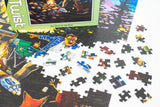 Partially assembled 500 piece jigsaw puzzle with loose pieces, featuring a man in a blue shirt and glasses by a campfire next to a river.