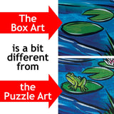 Two arrows point between box art and puzzle art of a pond; the puzzle image includes a frog on a lily pad that is not present in the box art.