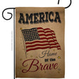 The Flag: America Home of the Brave Americana Star and Stripes Flag showcases a patriotic design with stars, stripes, gold stars, and the phrase America Home of the Brave on a tan background.
