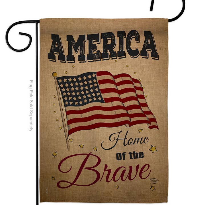 The Flag: America Home of the Brave Americana Star and Stripes Flag showcases a patriotic design with stars, stripes, gold stars, and the phrase America Home of the Brave on a tan background.