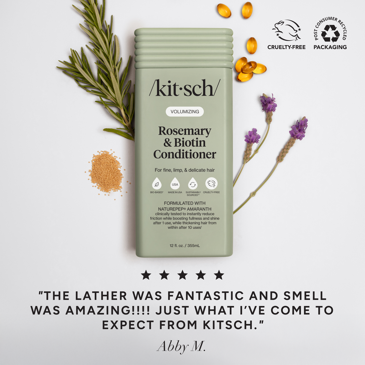 A 12 fl oz bottle of Hair: Volumizing Rosemary & Biotin Conditioner sits among rosemary, amaranth seeds, a purple flower, and cruelty-free and recycled icons—ideal for those wanting a thickening, volumizing conditioner.