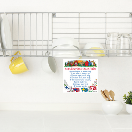 The 6"x6" Swedish Gift Wall Tile features Scandinavian House Rules with colorful houses and text, includes a hanger or stand, and makes a perfect piece of Scandinavian wall decor.