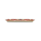 Rectangular ceramic tray with red William Morris-inspired floral pattern, slightly raised edges, viewed from the side against a white background.