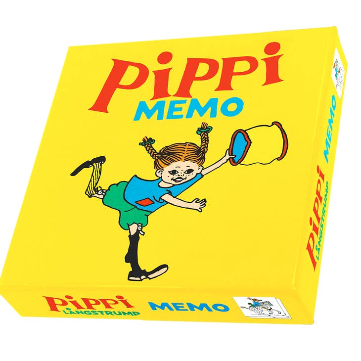 Bright yellow box of the Game: Pippi Longstocking Memory Game, showcasing an illustration of a girl with braids and colorful clothing, running and swinging a net, inspired by the cherished Swedish children's story.
