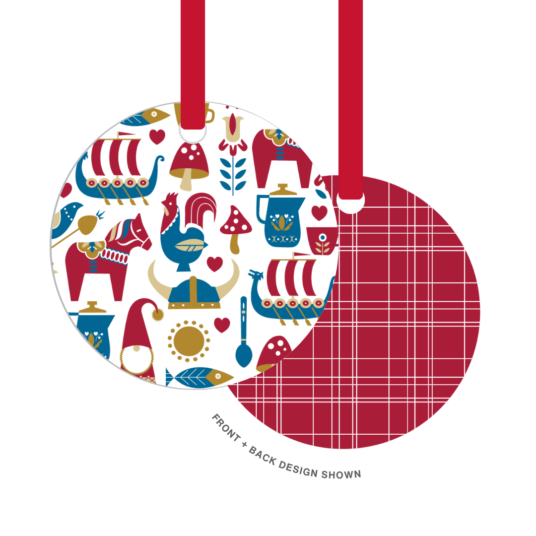 The "Nordic Love Metal Ornament" by Cindy Lindgren features two round Christmas tree ornaments with red ribbon loops: one displays a Scandinavian design with ships and axes, while the other highlights a festive red and white plaid pattern, perfect for infusing your holiday decor with Nordic love.