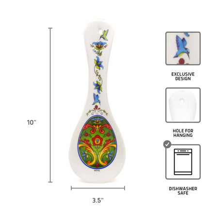 The Spoon Rest: Green Norwegian Rosemaling Ceramic Spoon Rest features a vibrant floral design, measures 10" x 3.5", has a hanging hole, is dishwasher safe, and makes a great addition to Scandinavian kitchen decor.