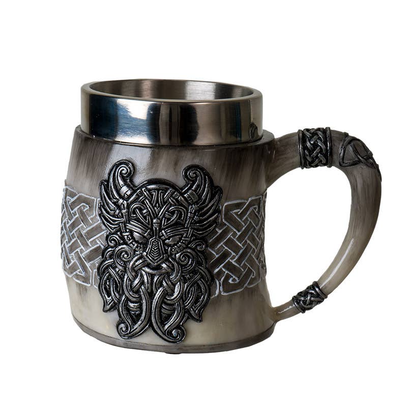 The Mug: Viking Odin's Horn Drinking Mug features a metallic interior and handle, a raised Viking face, detailed knotwork on the side, and an Odin’s Horn-inspired design—making it a perfect unique novelty gift.