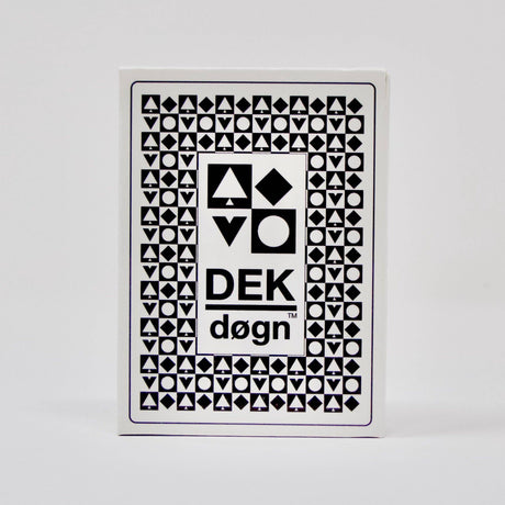 The DEK Døgn playing cards from Norway feature a unique aesthetic with geometric black designs set against a white background, highlighting Norwegian craftsmanship.