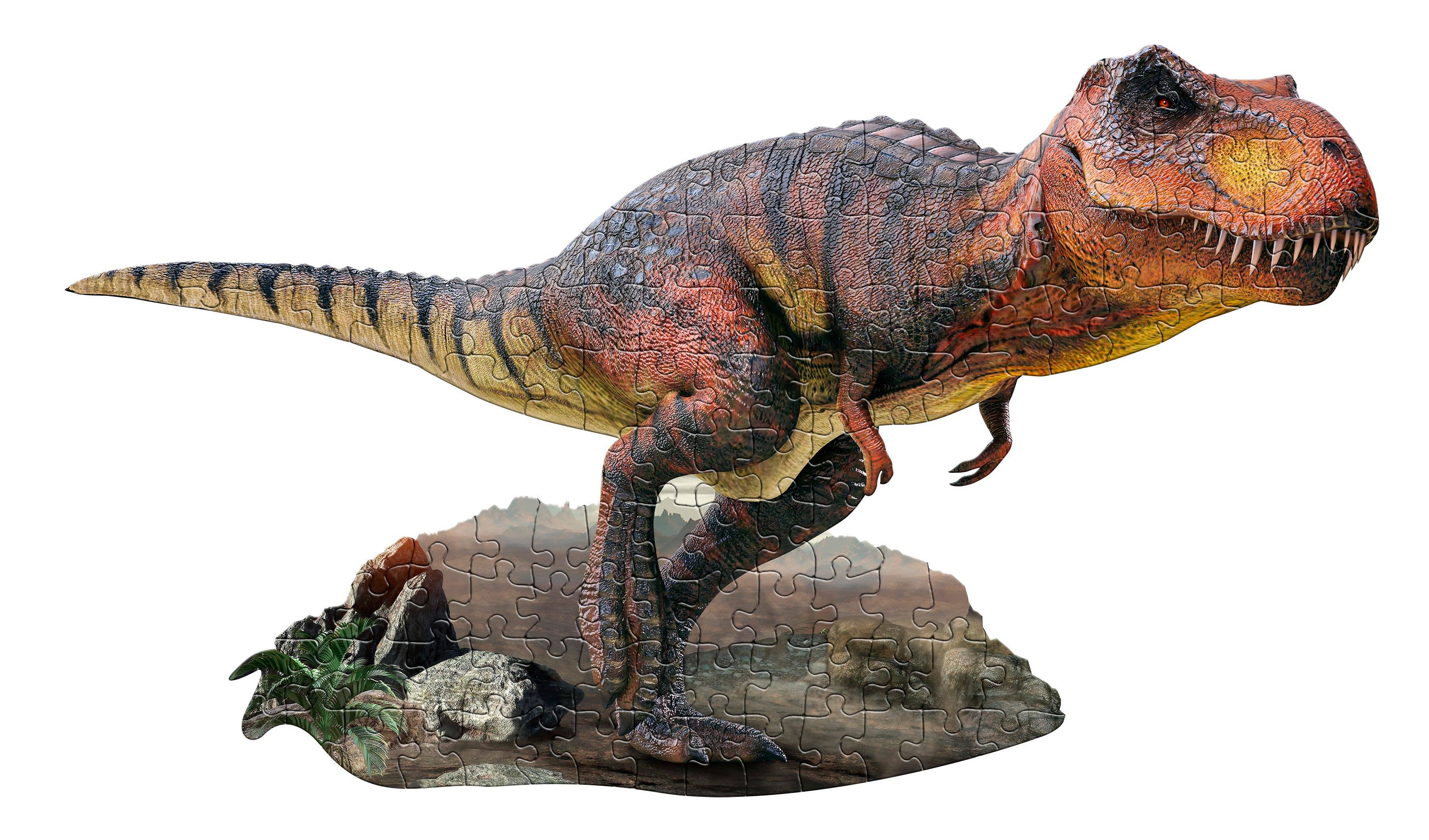 A completed Puzzle: I AM T. Rex 100 piece forms a dinosaur-shaped masterpiece, featuring intricate scales and vibrant colors, majestically standing on a rocky base. This animal-shaped jigsaw puzzle also includes educational fun facts to enrich your puzzling experience.