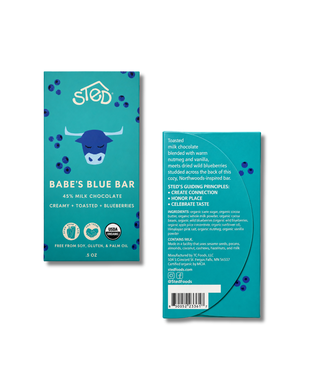Blue chocolate bar packaging with a blue bison illustration, images of wild blueberries, and text describing 45% milk chocolate with blueberries. Both front and back are visible.