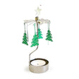 The Candle Holder: Green Tree Silver Rotary Candle Holder by Pluto Design Sweden features spinning green tree ornaments and a star on top, all powered by a tealight candle at the base.