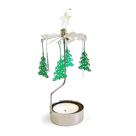 The Candle Holder: Christmas Trees Green with tea light Rotary Candleholder provides a cozy atmosphere with its silver design and rotating green Christmas tree ornaments, all powered by the soft glow of a tealight candle beneath.