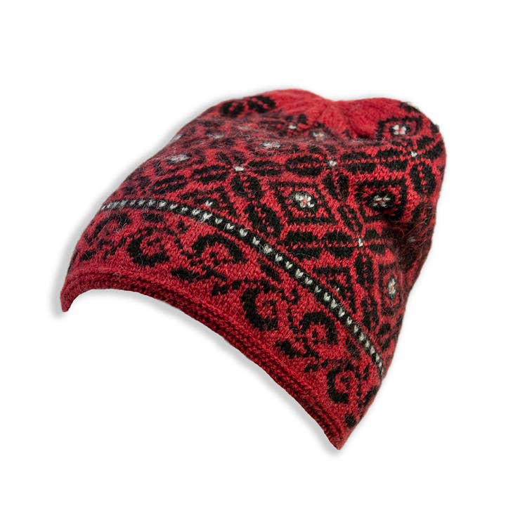 Dark red and black Moliden knitted beanie showcasing intricate geometric designs, reminiscent of a Nordic Patterned Hat.