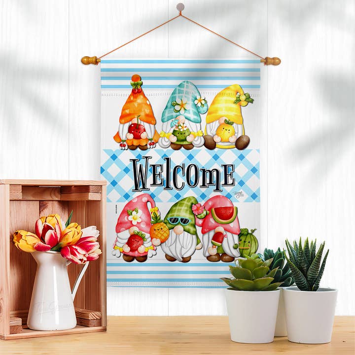 Add a playful touch to your space with the Sweet Gnomes Food Fruit Gnome Decor Flag, featuring cartoon gnomes, WELCOME lettering, and vibrant fruits—crafted from weather-resistant fabric for long-lasting charm.