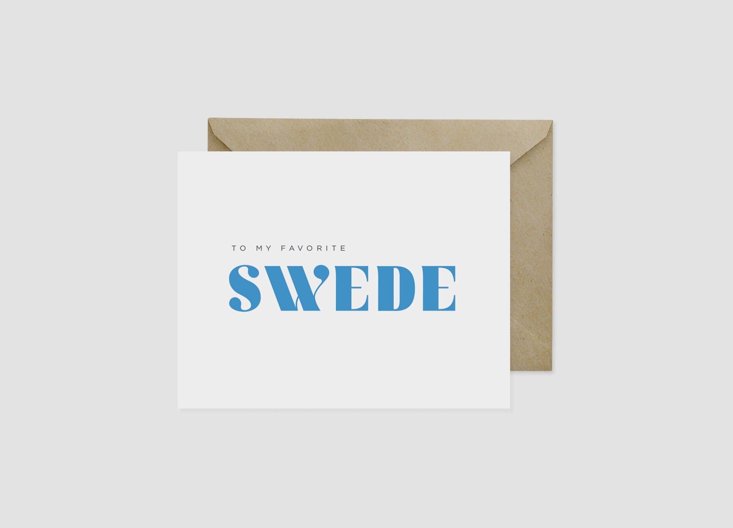 The "To My Favorite Swede" greeting card (4.25"x5.5") features blue text, is blank inside, and comes with an envelope and sleeve—perfect for celebrating someone special.