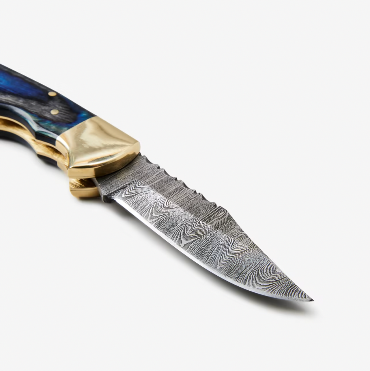 The Blue Diamond Wood Folding Knife features a Damascus steel blade, brass bolster, back lock mechanism, blue and black handle, and comes with a leather sheath. Photographed on a white background.