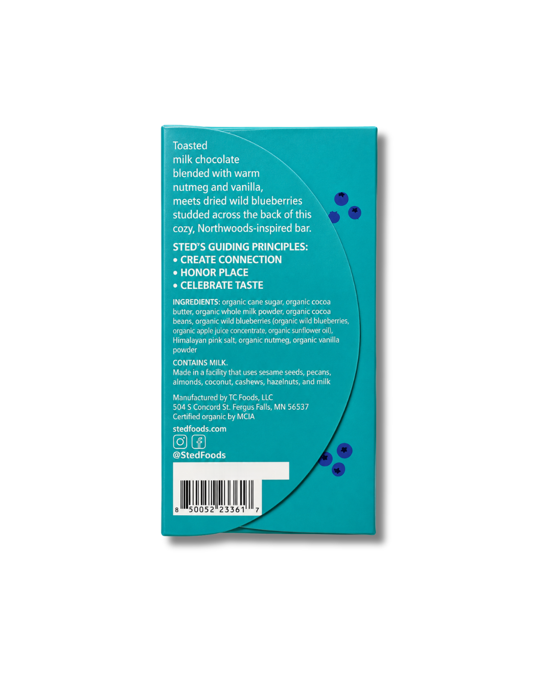 Back of a blue chocolate bar package showing wild blueberries, milk chocolate, ingredient list, company details, bean-to-bar statement, and social media handle.