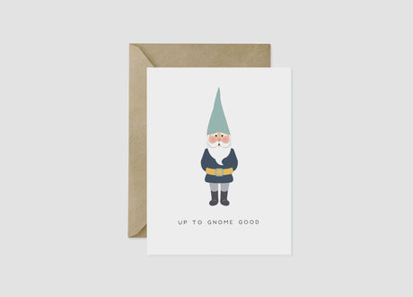 The Up to Gnome Good Greeting Card (4.25" x 5.5") features a blue-outfit gnome above the phrase UP TO GNOME GOOD, is blank inside, and includes a brown recycled envelope.