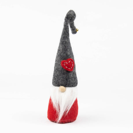 Scandinavian Tomte figurine with a tall gray hat featuring a red heart, long white beard, and red body.