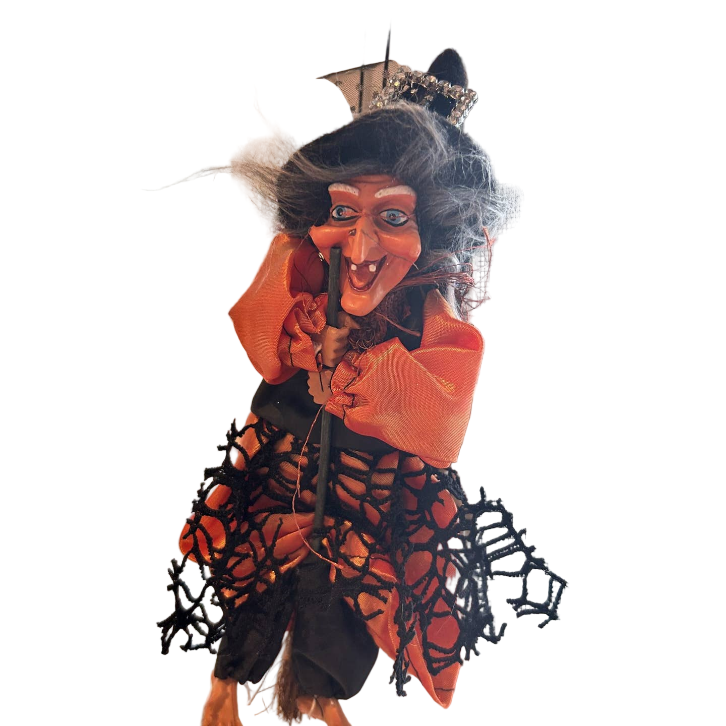 The Decor: Kitchen Witch Doll – Sirene Orange (10.2" Tall) features wild gray hair, orange clothes, black hat, netted apron, and broomstick—a Northern European good luck charm for unique kitchen decor. Isolated on white background.