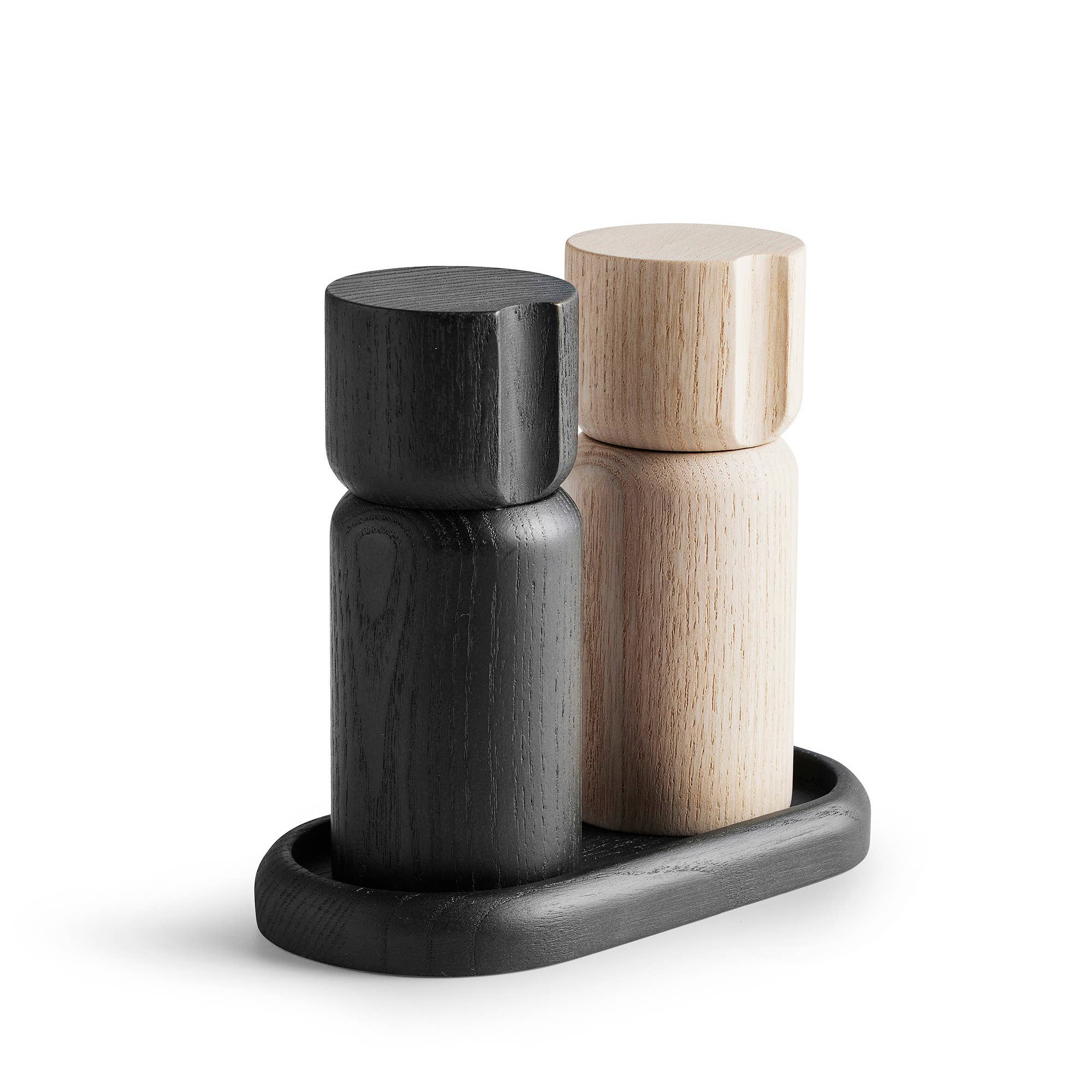 The Shakers: Salt and Pepper Grinder Set from Sweden includes two wooden mills with ceramic grinders, one black and one light ash wood, elegantly displayed on a matching tray.