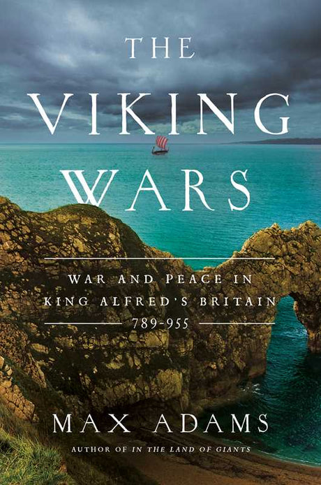 Paperback book cover for Viking Wars by Max Adams, 512 pages, features dramatic cliffs over turquoise water with a Viking longship below a cloudy sky. Subtitle: King Alfred’s Britain, 789–955, set in Viking Age Britain.