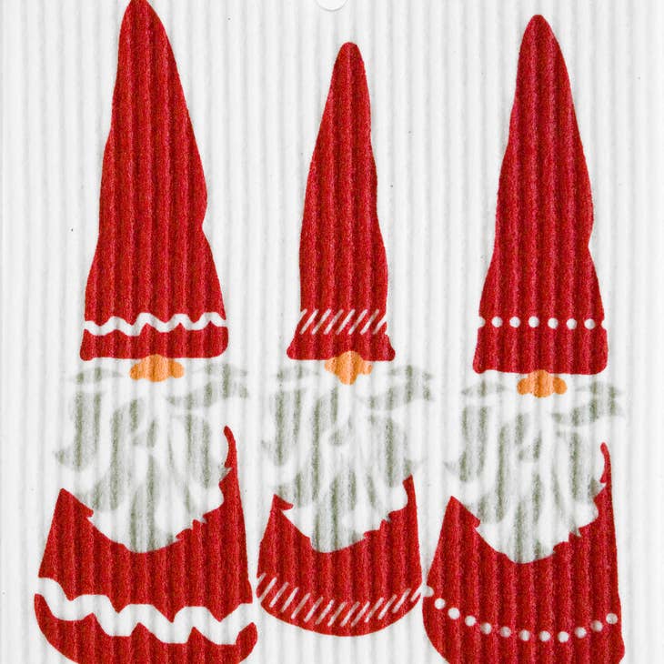 The Three Tomten dish cloths feature three charming gnomes with long red hats and white beards on a textured background. They’re super absorbent, environmentally friendly, and blend charm with practicality.