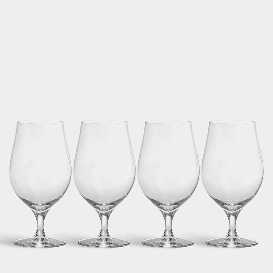 Four 16oz Orrefors Beer Taster Glasses from the 4-Pack are aligned against a simple white backdrop, each radiating elegance similar to that of classic wine glasses.