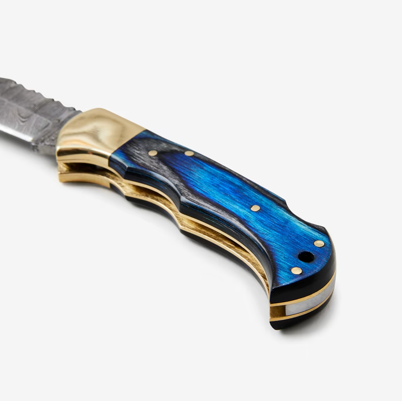 A close-up of the Blue Diamond Wood Folding Knife with a metallic blue and gold handle, decorative ridges and rivets, shown against a white background; includes leather sheath.
