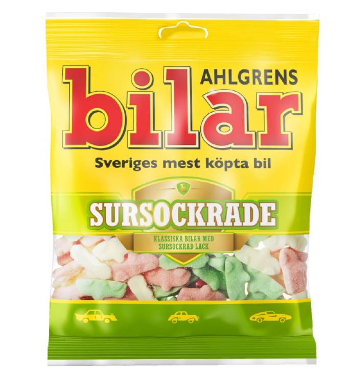 Ahlgrens Bilar Sursockrade (100g): Classic Swedish candy—sour marshmallow car-shaped gummies in pink, white, and green, packed in vibrant yellow packaging.
