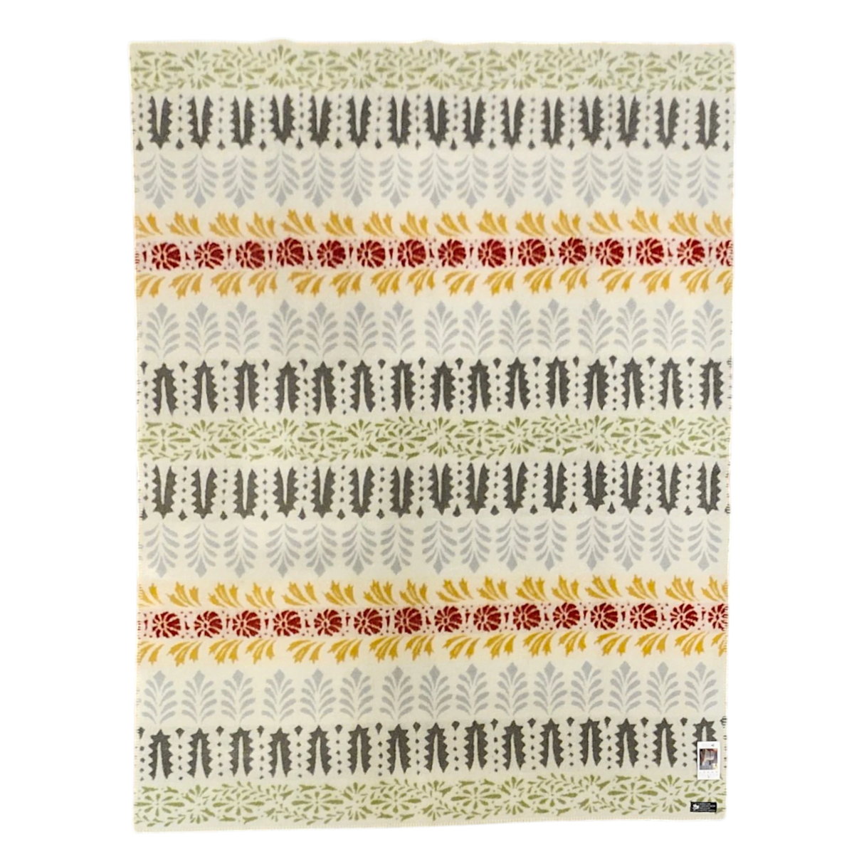 Patterned rug with Swedish-inspired rows of green, yellow, gray, and red leaf and floral motifs on a cream background.