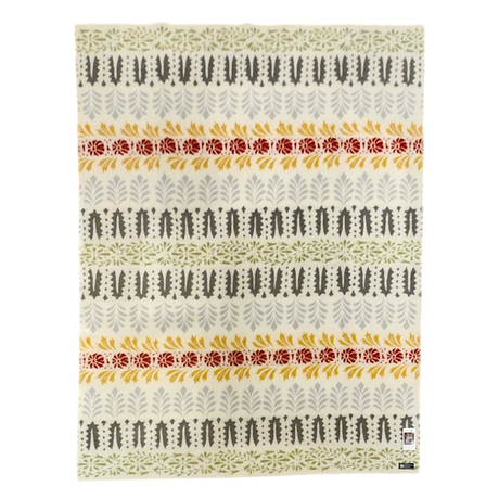 Patterned rug with Swedish-inspired rows of green, yellow, gray, and red leaf and floral motifs on a cream background.