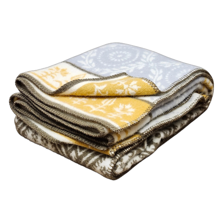 Folded lambswool blanket featuring yellow, white, and brown floral patterns with dark brown stitched edges, displayed on a white background.