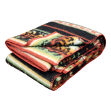 Folded Bunad blanket with horizontal stripes in red, green, yellow, black, and orange and a visible tiger pattern.