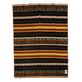 Rectangular Bunad blanket with horizontal stripes in black, orange, yellow, and red, decorated with detailed floral and geometric patterns.