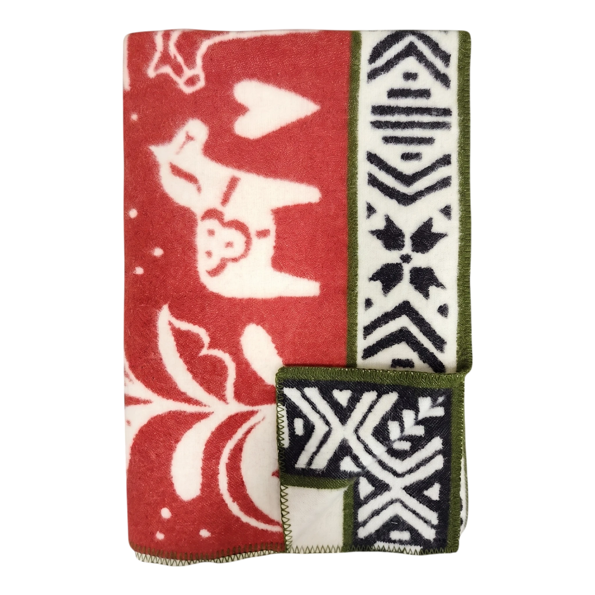 Folded red and white lambswool blanket featuring animal, heart, and geometric patterns, Swedish Dala horses, and green trim.