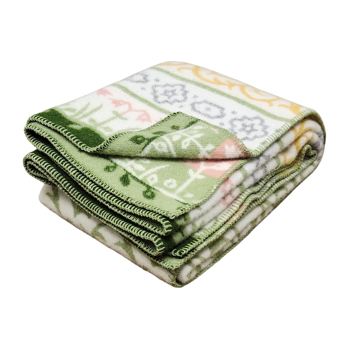 Folded blanket made from Norwegian lambswool with green, yellow, and white floral and geometric patterns on a white background.
